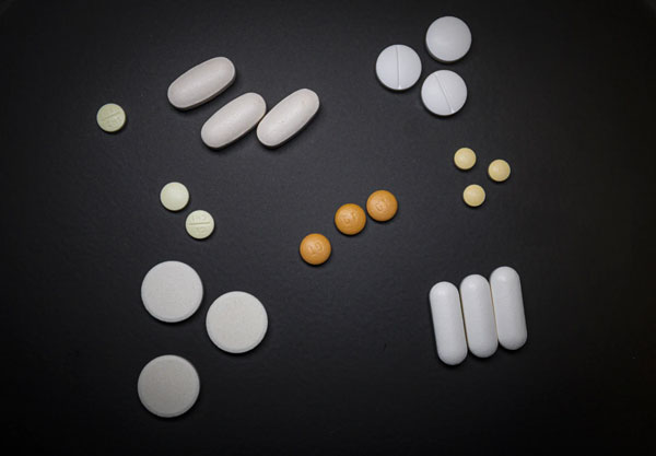 Different medications in a variety of shapes, colors, and sizes.