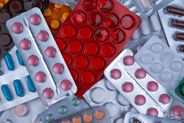 An assortment of medications in blister packaging