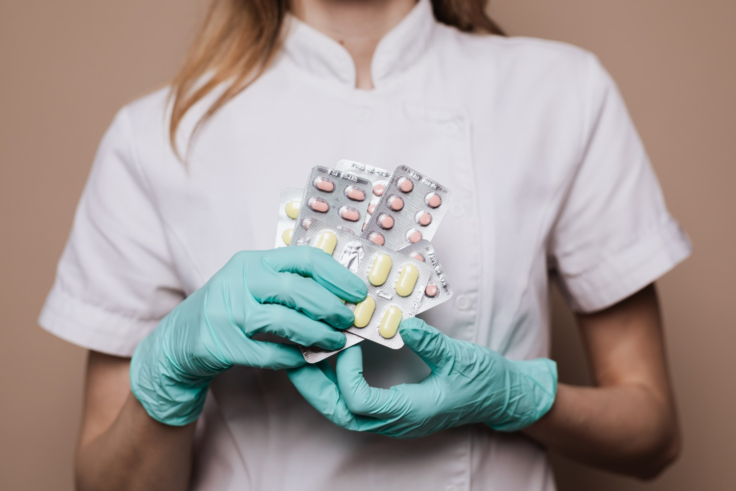 A person holding medications